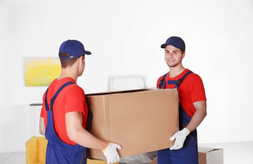 Removal team preparing items safely for a move