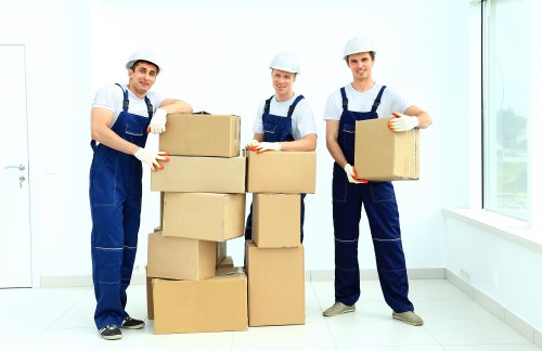 Removal van and moving team preparing a house move in Southlambeth