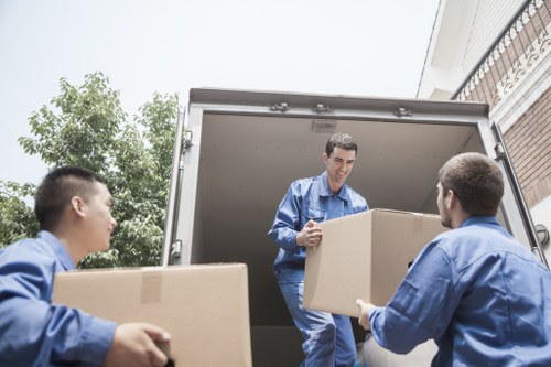 Removal van and moving boxes in a Southlambeth street
