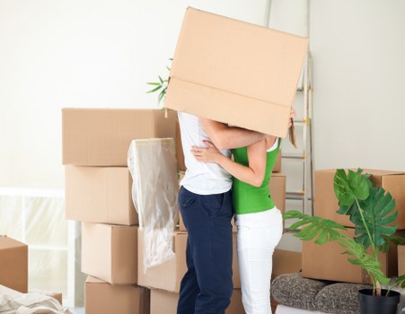 Professional movers handling furniture in Southlambeth