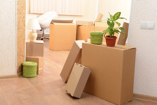 Packed boxes and furniture wrapped for a local removal service